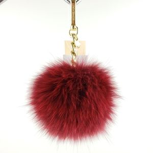 NWT Michael Kors MD key charm pom pom fob fox fur